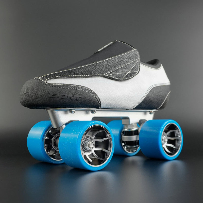 Skater lacing up a pair of Bont Envy boots before a speed skating session
