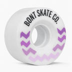 Three-quarter view of the White/Purple Glide outdoor roller skate wheel in neutral white with purple chevrons