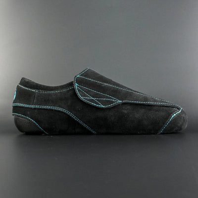 Side view of the Envy suede skate showing black suede finish
