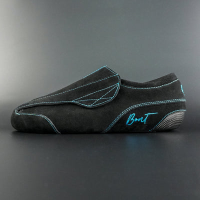 Side view of the Envy suede skate showing black suede finish