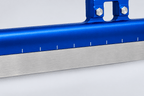 Close-up of the white bending reference marks along the blue GT3 blade tube above the steel runner.