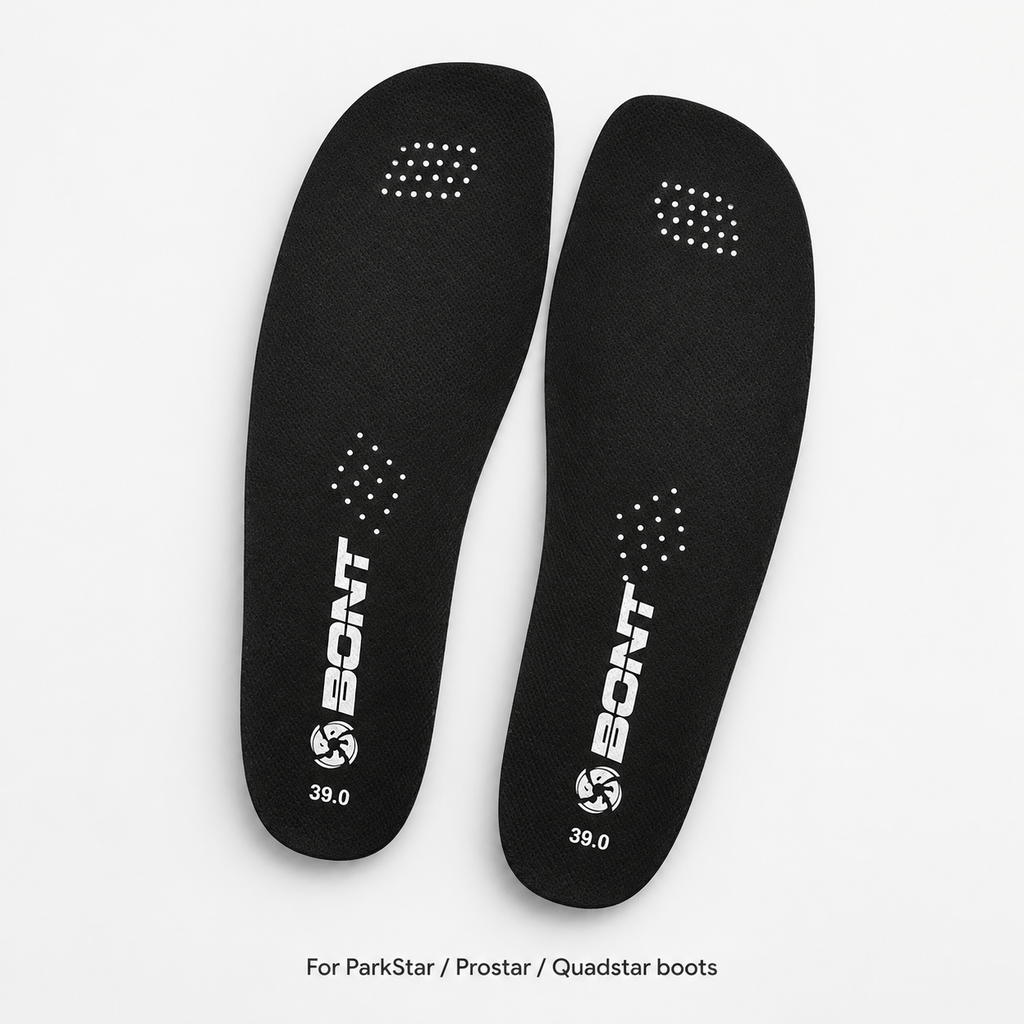 Angled studio view of black replacement insoles for ParkStar, Prostar, and Quadstar boots.