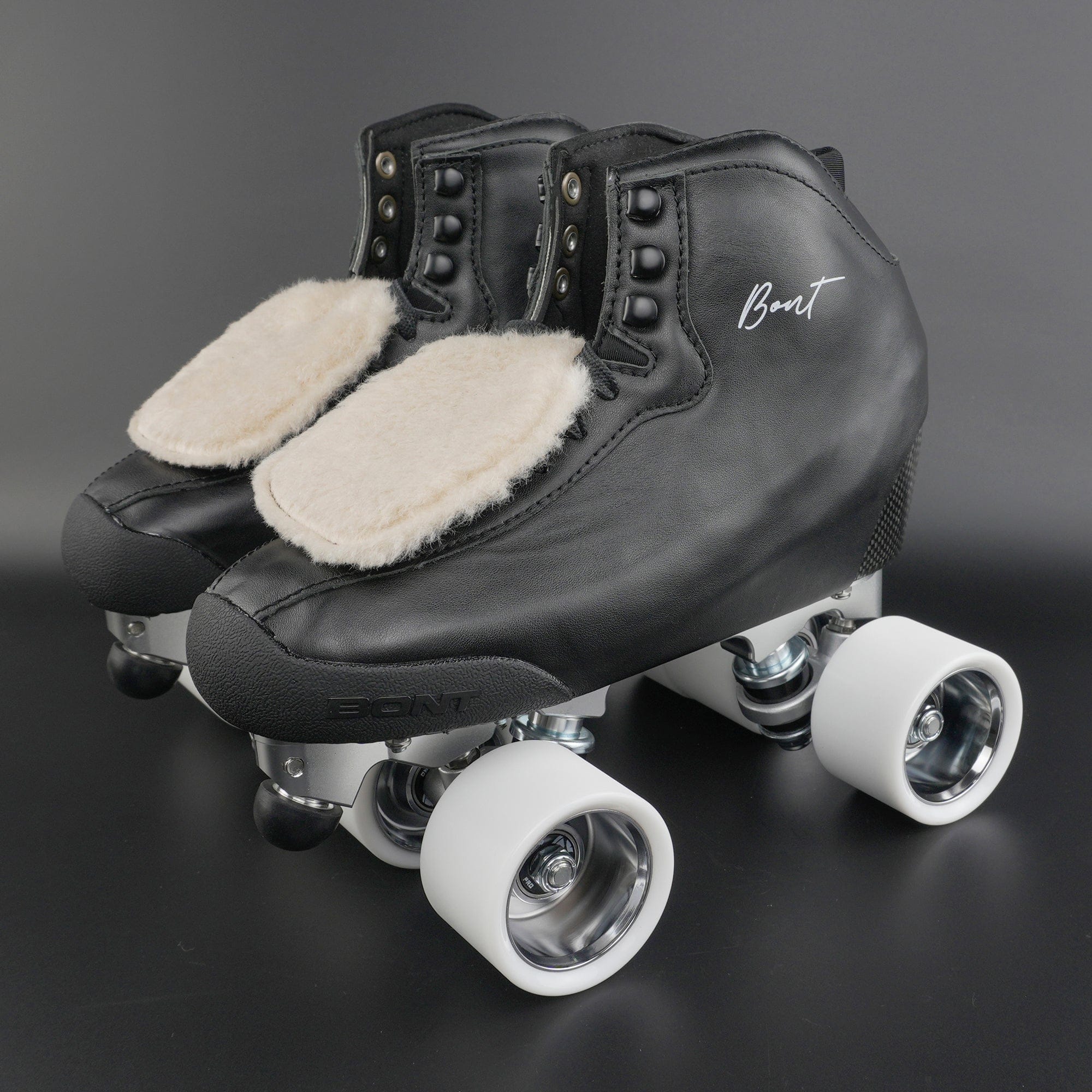 Close up of aluminum skate plate and Ultraglide wheels