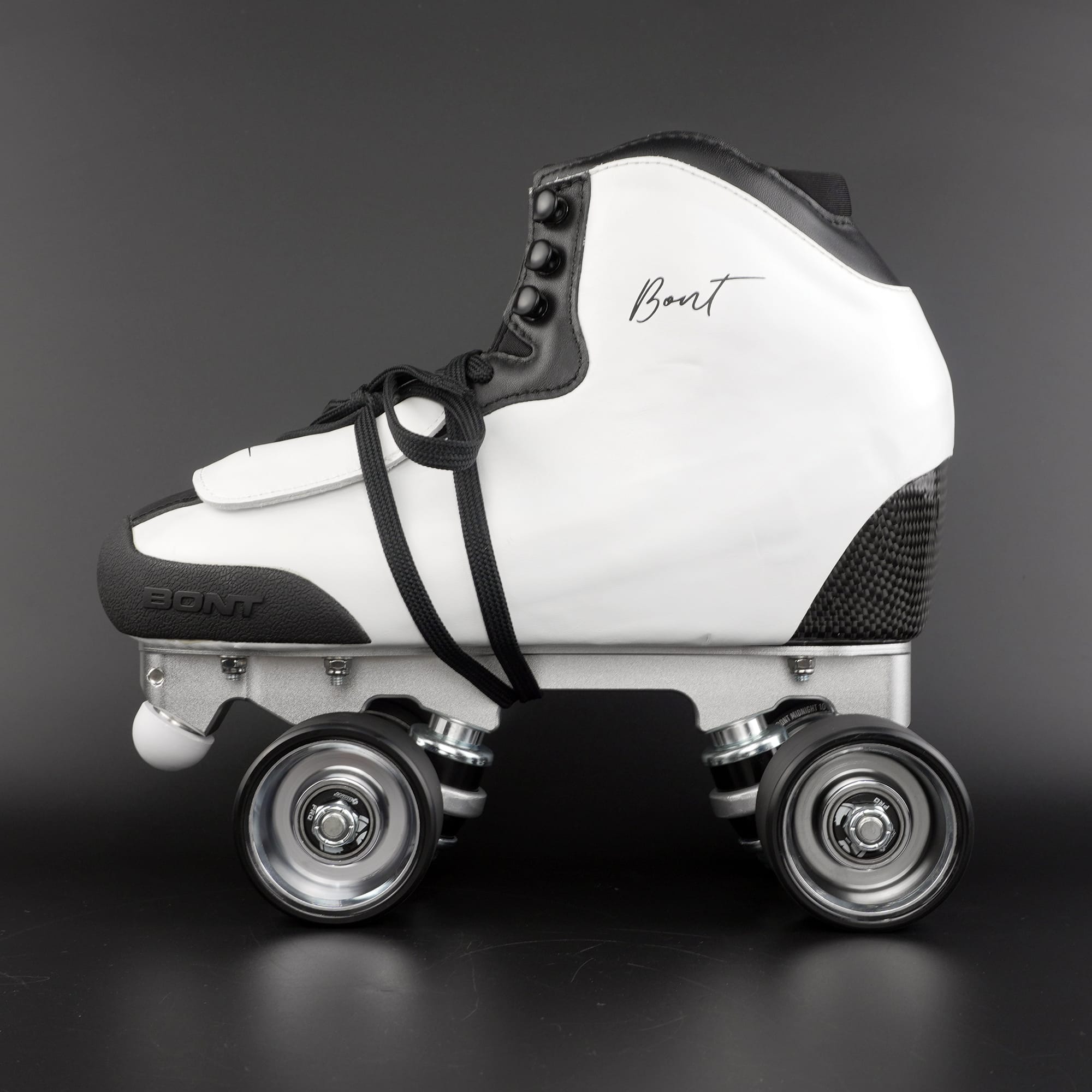 Rhythm skate setup showing lightweight boot and quad wheels