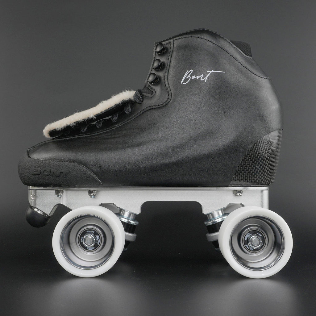 Side view of a rhythm roller skate with carbon fiber base