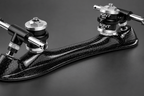 Close-up of the curved carbon fiber body and gloss woven finish