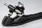 Detail of the quick-release clip axle, black 88A double-barrel cushions, and silver retainers