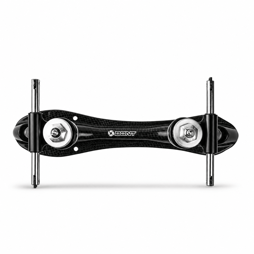 Top-down view of the gloss carbon plate, Bont logo, mounting holes, and clip axles